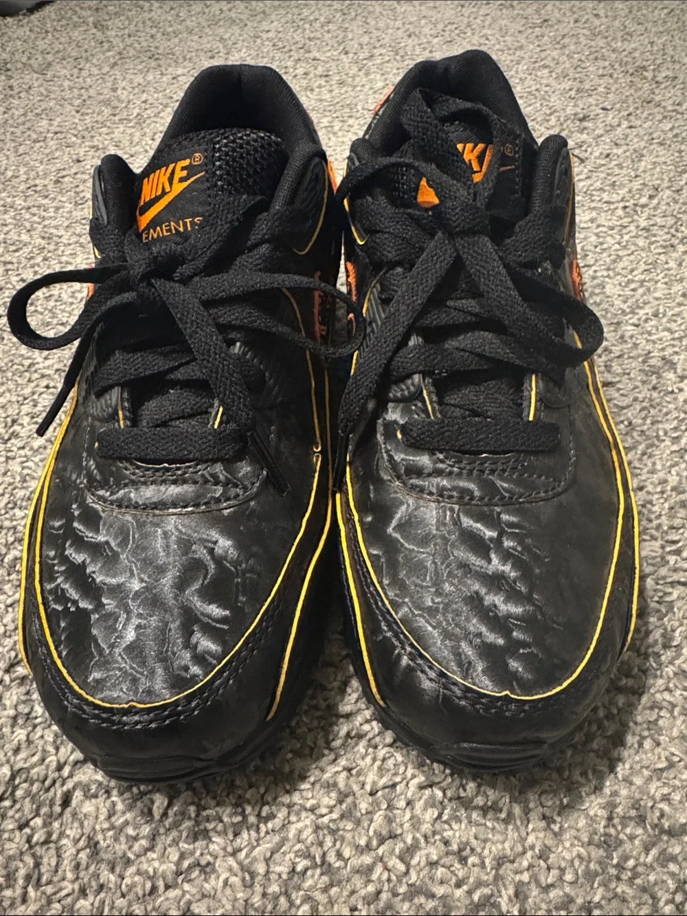 Nike Black Sneakers with Orange Accents